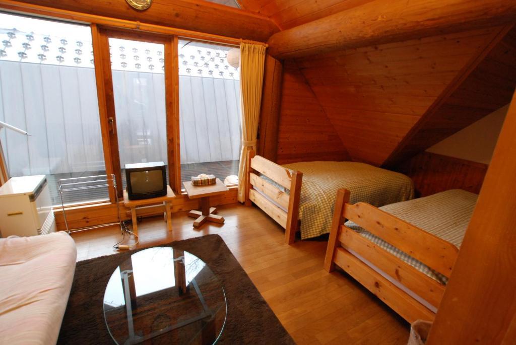 Pension Woody Note Niseko Rum bild